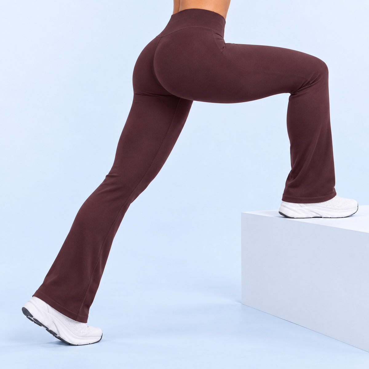 AURBYO women's Sculpt Flare Leggings in Deep Coffee, step-up pose from the side